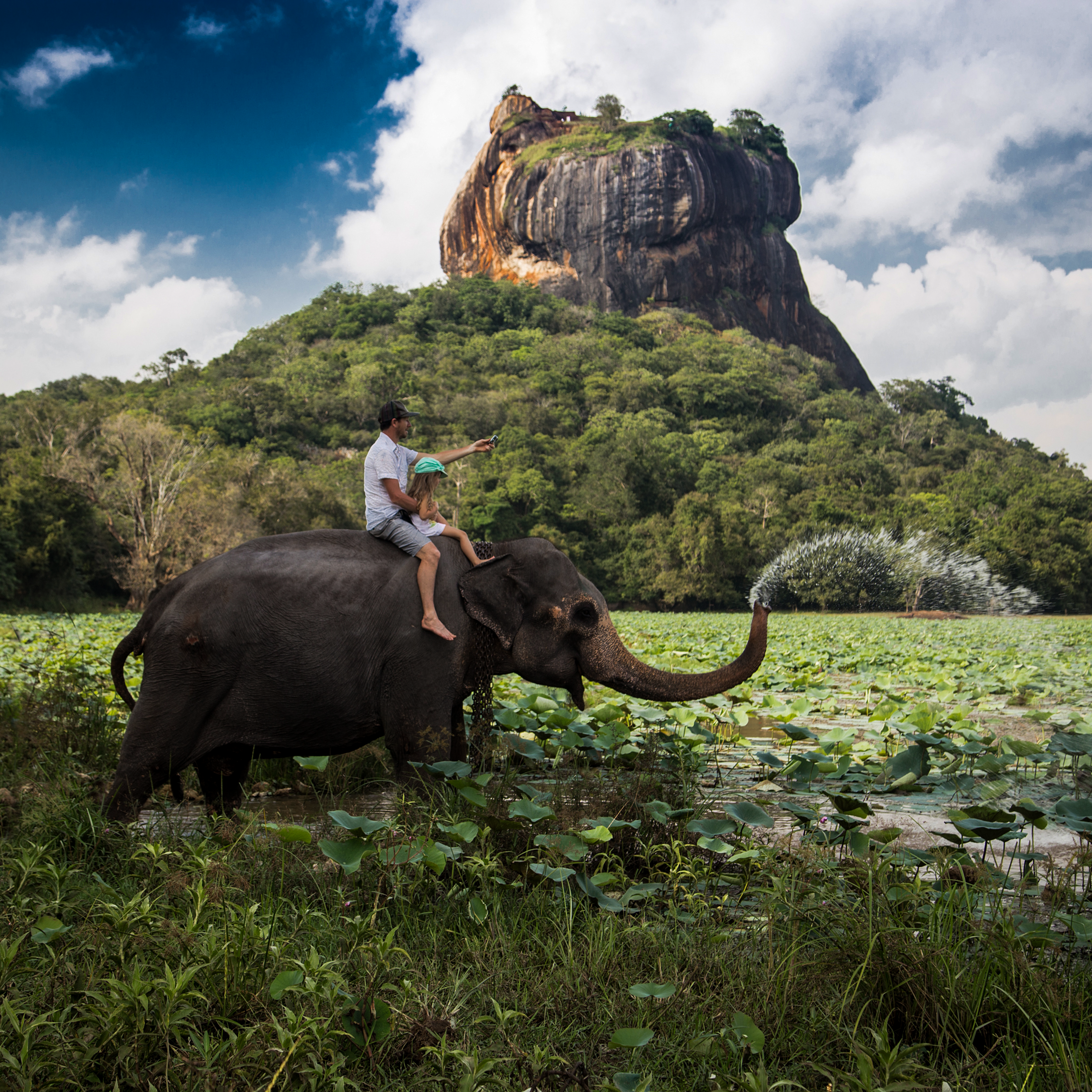 Sigiriya rock fortress rising above Sri Lanka’s green landscape