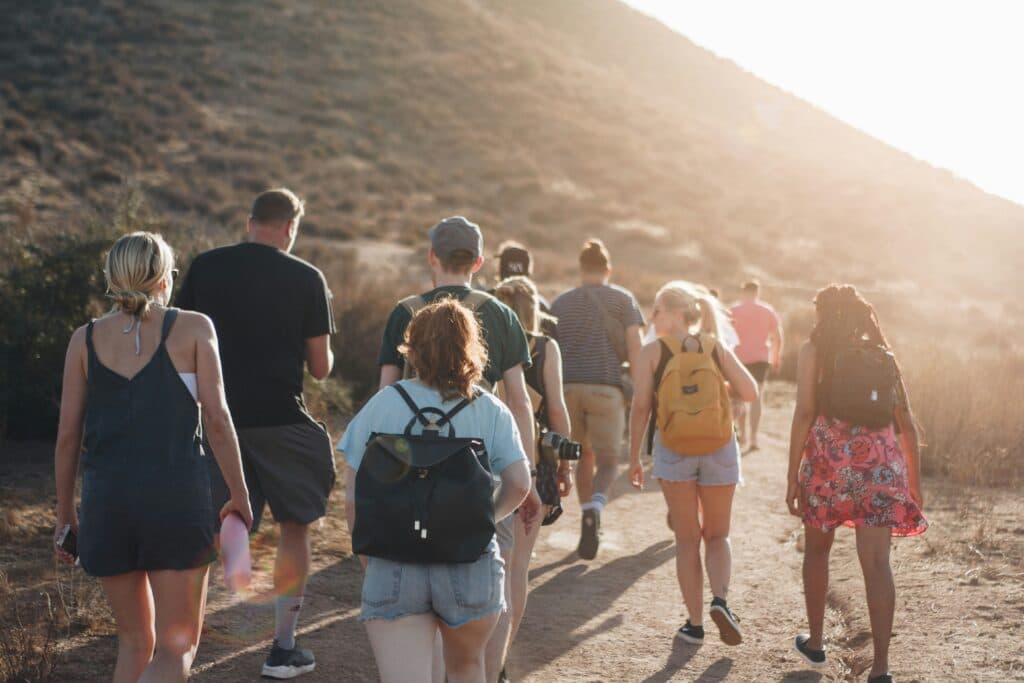 A group exploring a scenic walking trail together